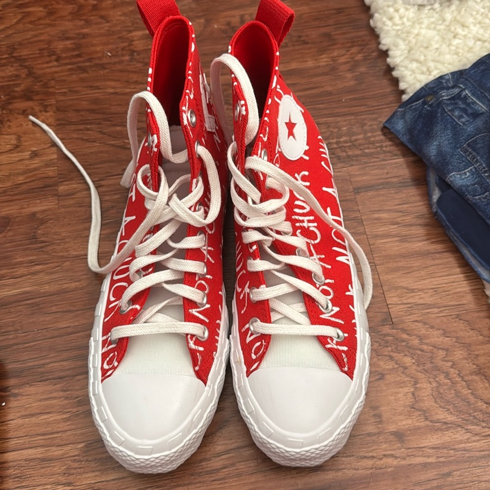 Converse red high top sneakers